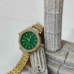 ساعت طلائی صفحه سبز کد 2105